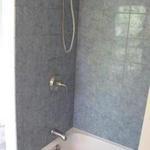 new tub and tile walls