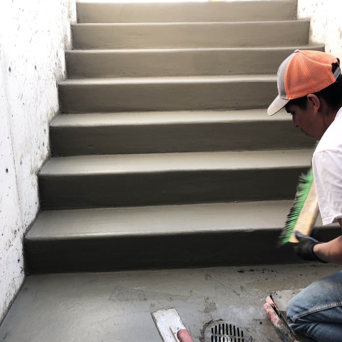Concrete steps into basement
