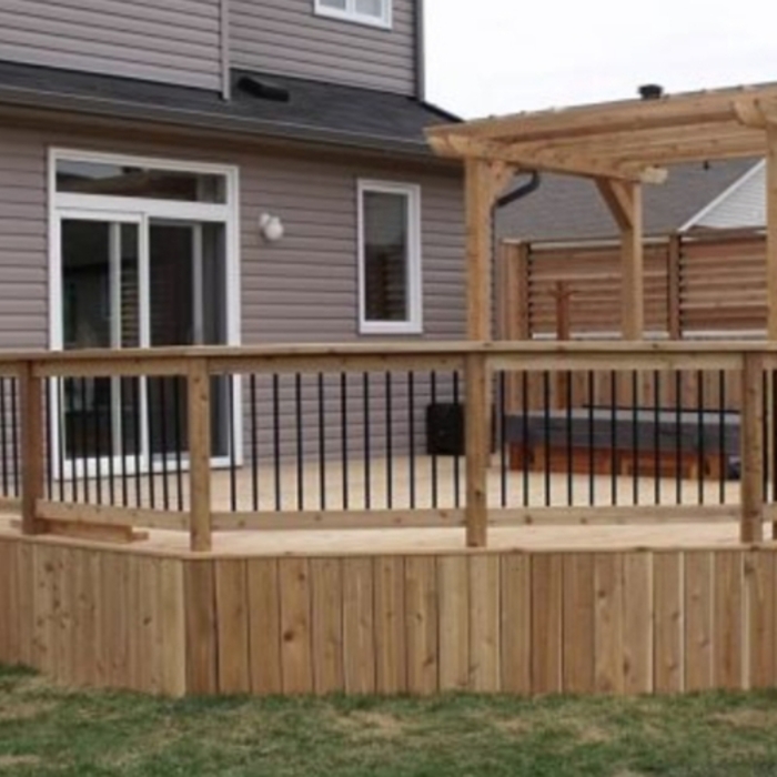 Deck with a jacuzzi tub in it.