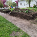 retaining wall east side of property