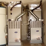 2 vertical furnaces in garage