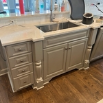 Water damaged flooring under cabinet