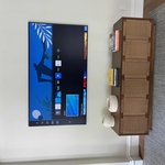 Samsung flat screen TVs with equipment hidden in c