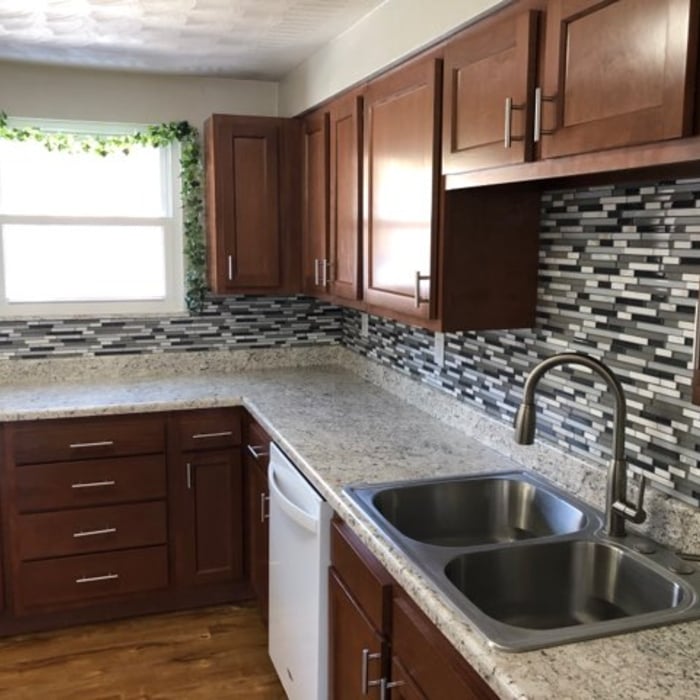 Kitchen remodel cabinets countertop tile backsplas