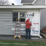 Siding repair with window replacement