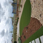 Modern Paver Walkway with Artificial Turf Accents
