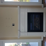 65" TV Mounted over fireplace