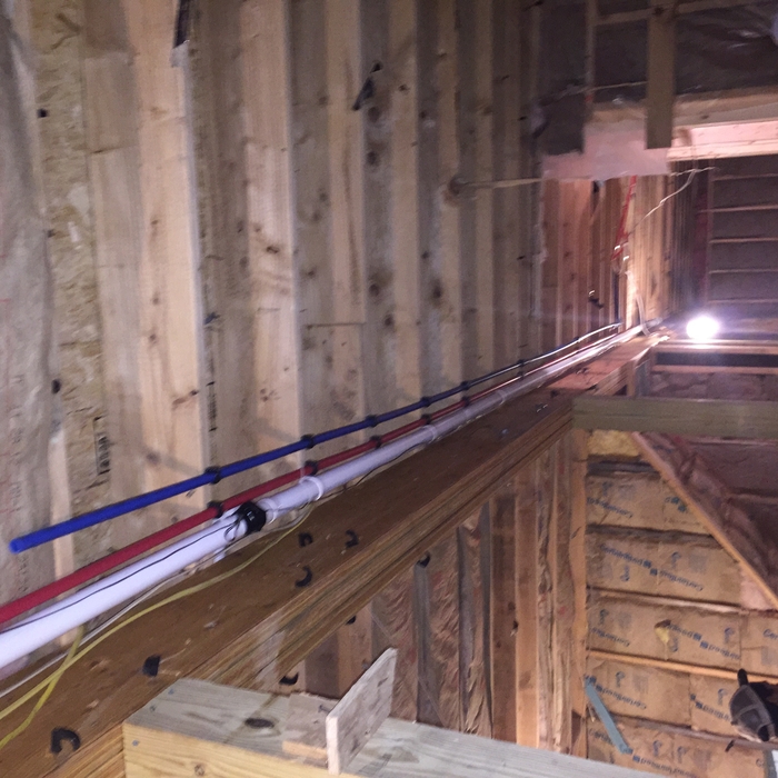 Water lines feeding upstairs units