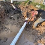 Fixing a septic line that busted.