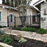 Metal fence with access door