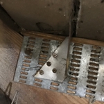 Roof to wall attachment