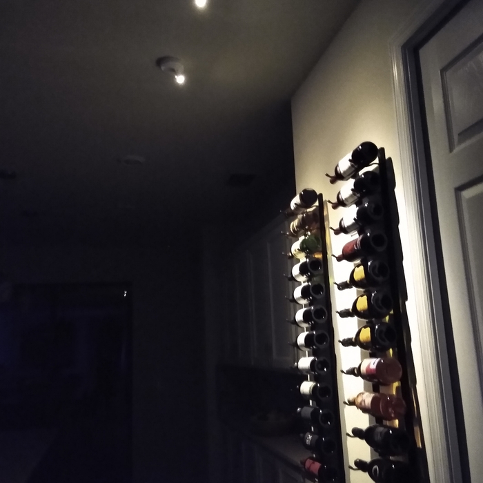 Accent lights highlight wine rack
