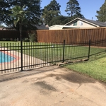 Metal Ornamental Fence and Wooden Privacy Fence