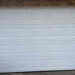 INSTALL NEW GARAGE DOOR