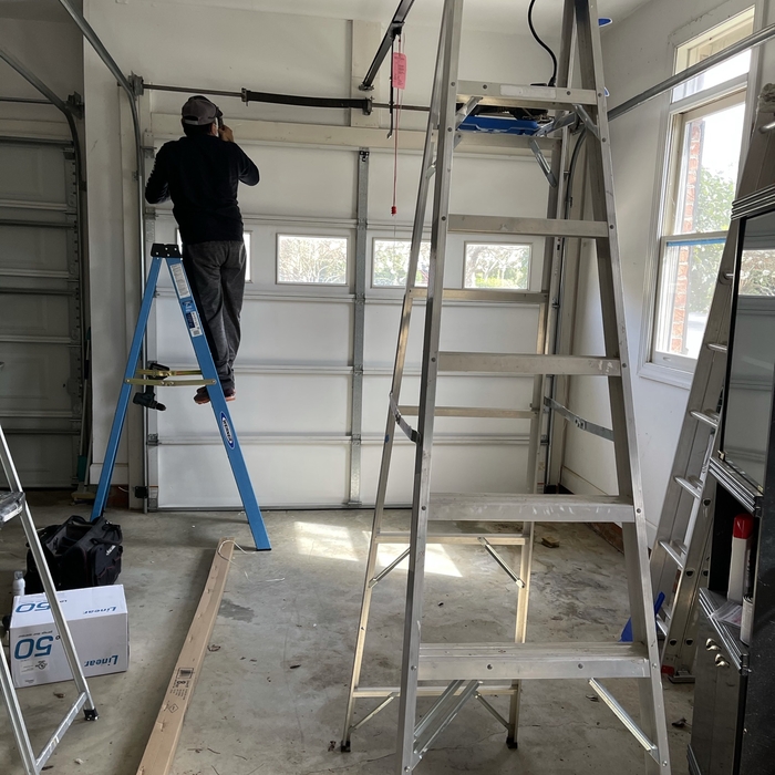REPAIR GARAGE DOOR