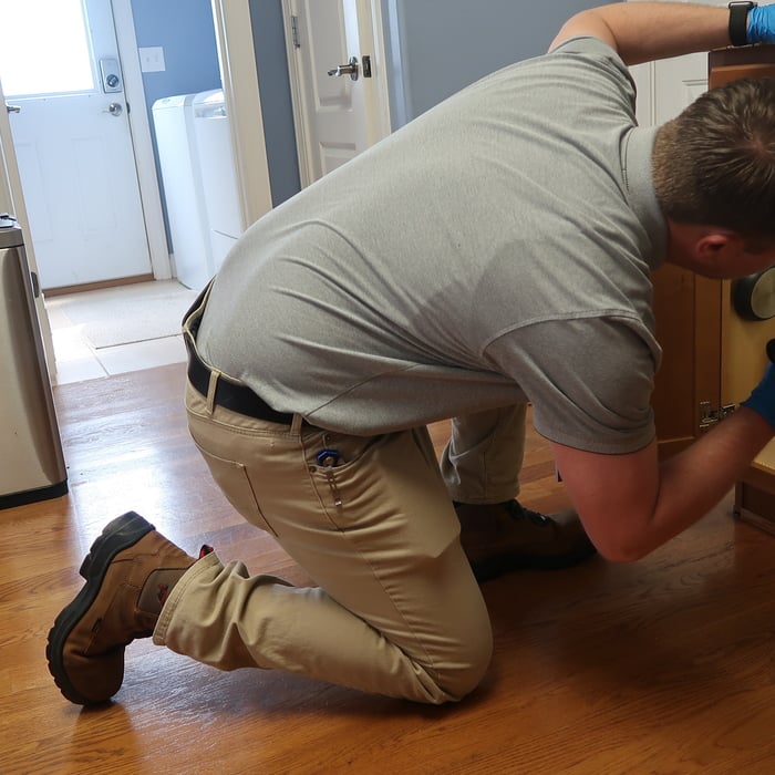 Examining Kitchen Cabinet