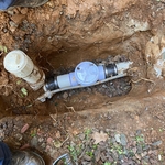 Installation of a new drain backflow preventer.