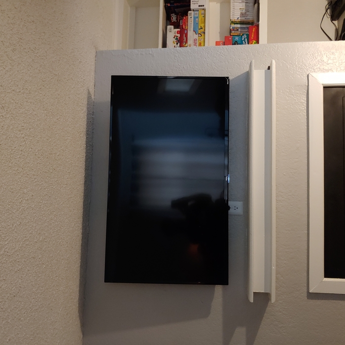 TCL 55-inch over fireplace