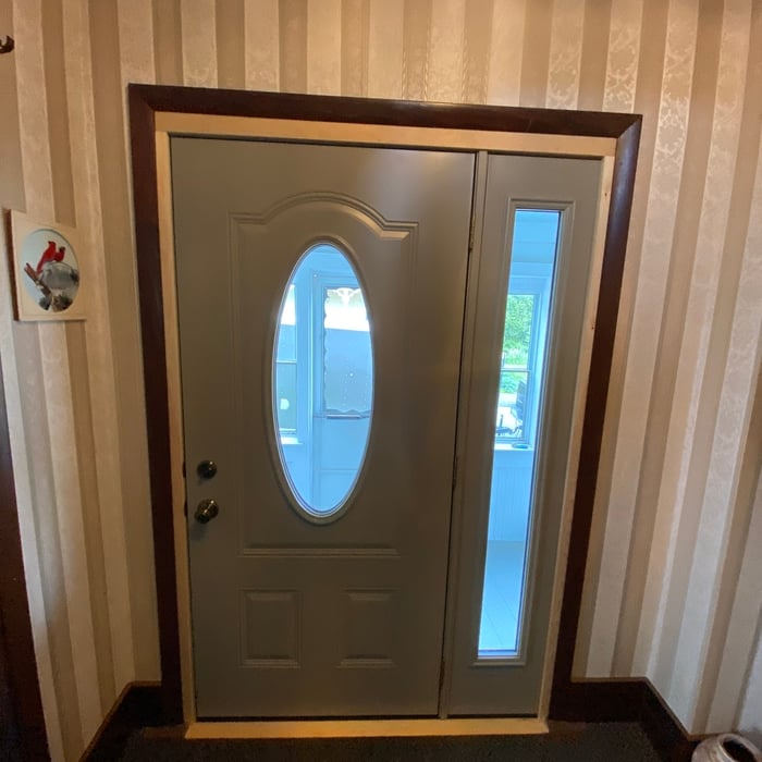 Door with sidelite interior