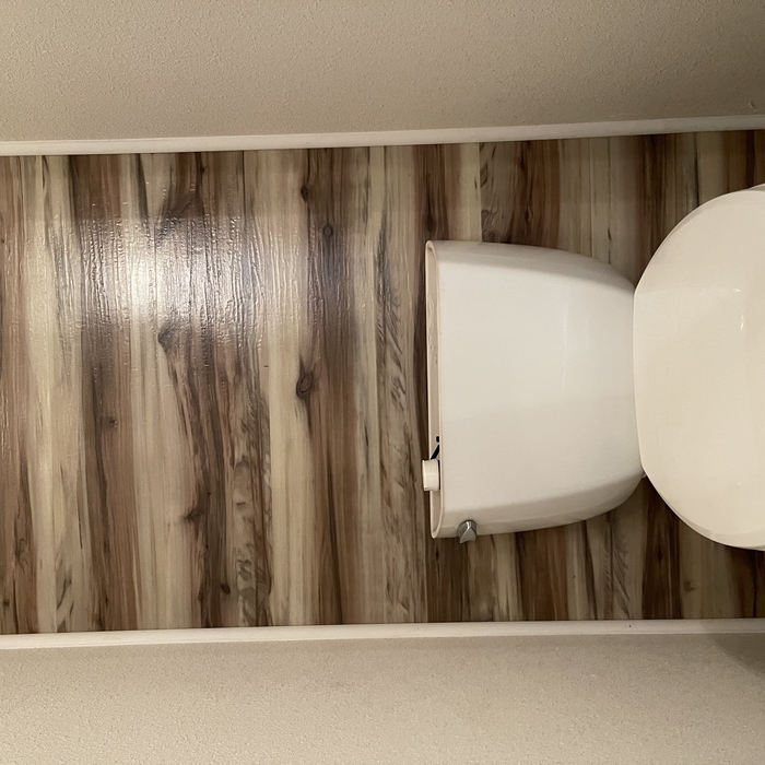 Master Bathroom LVP Planking Wall Design