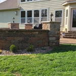 Patio wall bench, steps and landscape