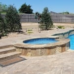 Raised Spa w/ spill and natural stone