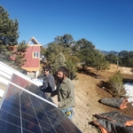 Mounting the solar panel to the racking