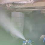 The crawlspace filled with our dry fog treatment