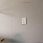 Outlet install for a mounted tv