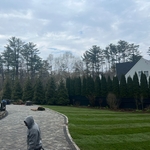 New sod and paver driveway