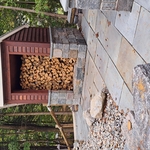 Wood storage shed. Built out of Adirondack thin stone veneer granite and bluestone sills.