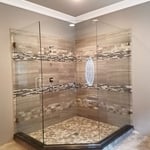 installed new glass shower enclosure