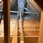 Blowover insulation being installed.