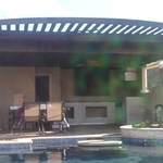 Pergola over outdoor kitchen