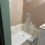 Installed shower pan.