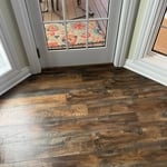 New flooring tied into Eyebrow door out to deck