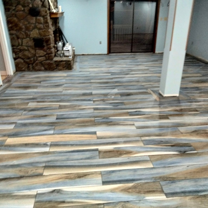 Custom Tile basement installation with border