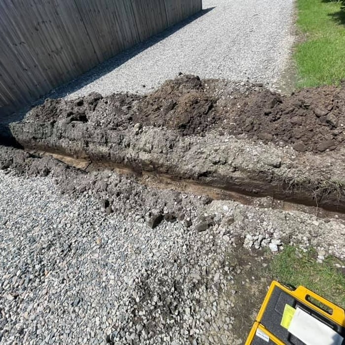 10" wide, 18" deep drainage ditch