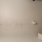 Water Damage to bathroom wall