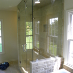 Frame less shower enclosure