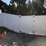 Vinyl gates and fence slope