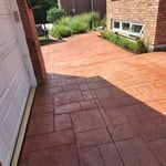 John's stamp drive way