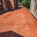 John's stamp drive way