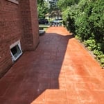 John's stamp drive way