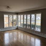 Drapery panels over verticals