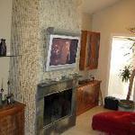 Flat TV above fireplace