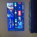 Tv mounted bedroom 70in