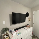 TV flush against the wall