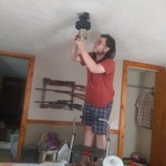 Ceiling fan installation.