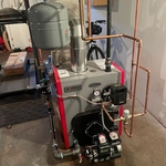Oil fired oiler with coil